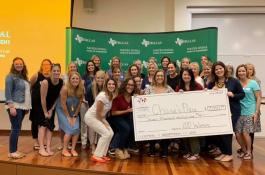 women present check to Chase's place