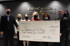 Dallas Capital Presents Check